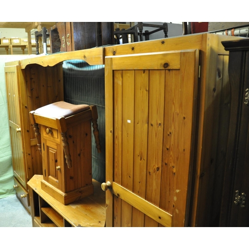 565 - Collection of pine furniture to include; twin section wardrobe, corner unit, TV unit, corner cupboar... 