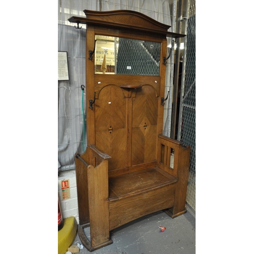 569 - Early 20th Century oak mirror back hall stand with box seat.
(B.P. 21% + VAT)