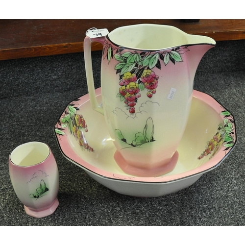 79 - 1930's design Staffordshire pottery jug and basin with matching toothbrush vase. (3)
(B.P. 21% + VAT... 