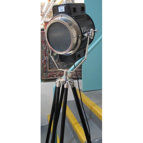 108 - A large reproduction metal and chrome finish spotlight on extendable tripod stand.
(B.P. 21% + VAT)