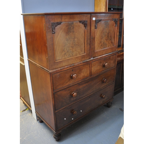 552 - Victorian mahogany press cupboard of low and small proportions, the moulded top above two blind pane... 