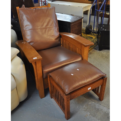 558 - Modern Mission style oak and leather plantation type reclining armchair with matching footstool.
(B.... 