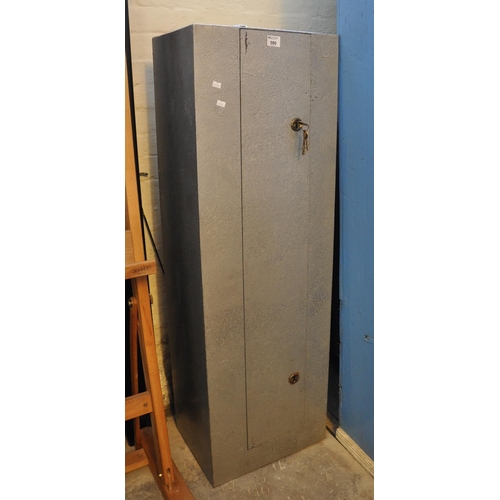 580 - Heavy metal silvered finish gun cabinet with key and two locks.
(B.P. 21% + VAT)