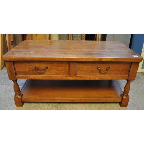 581 - Modern oak two drawer coffee table with under tier.
(B.P. 21% + VAT)