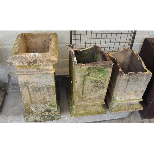 590 - Three chimney stacks, two in very distressed and damaged condition, together with a brass and mesh f... 