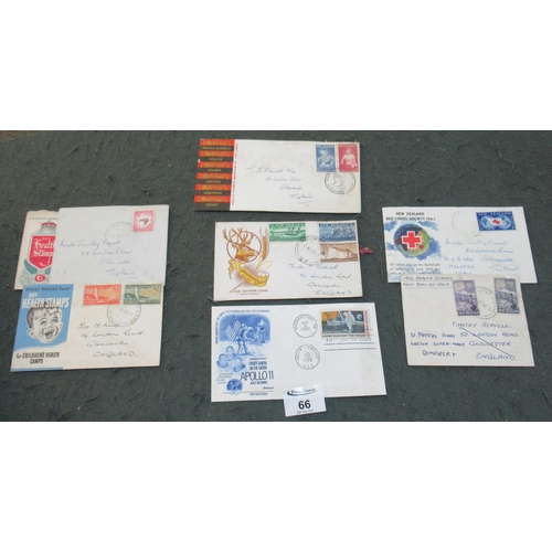 66 - All world stamp collection in two old albums and stockbook plus range of first day covers.
100's of ... 