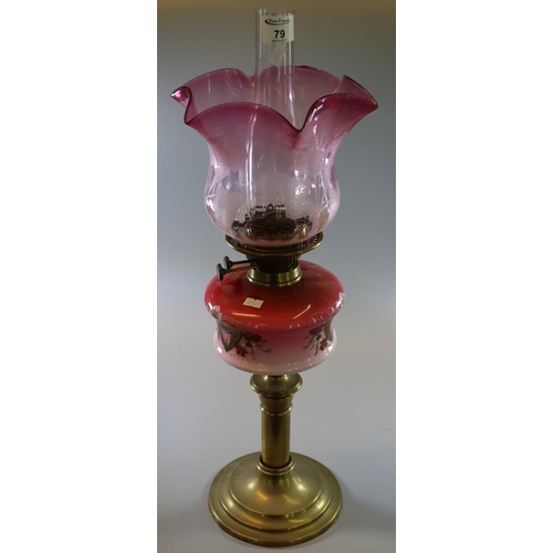 79 - Early 20th century double oil burner with cranberry and clear glass frilled shade etched with foliag... 