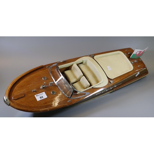 84 - A scale model of an Italian Riva sports boat. 65cm long approx.
(B.P. 21% + VAT)