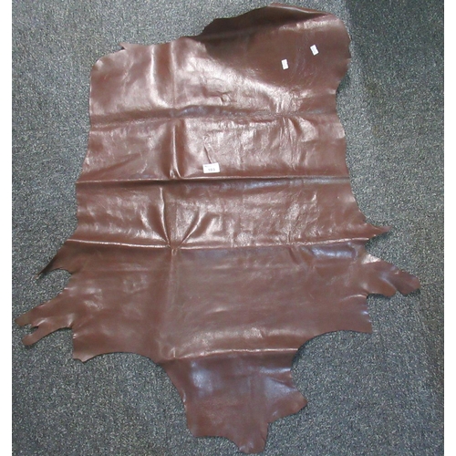 103 - A piece of brown leather skin.
(B.P. 21% + VAT)