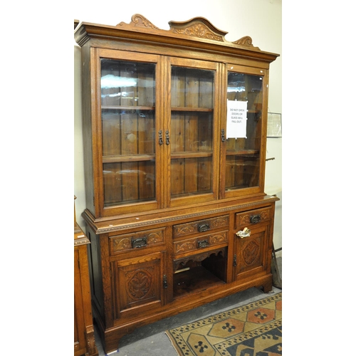 538 - Late 19th/early 20th Century oak two stage cabinet backed glazed dog kennel dresser. 
(B.P. 21% + VA... 