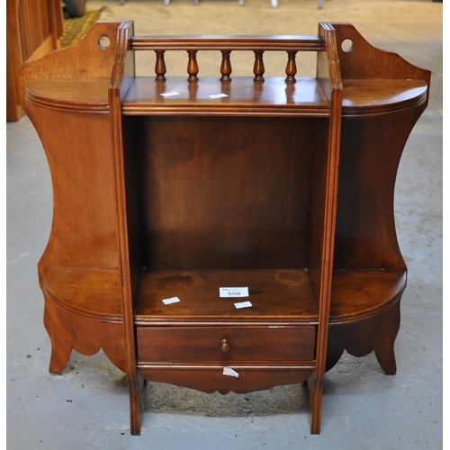 550 - Edwardian style mahogany single drawer wall shelving unit with pierced spindles. 
(B.P. 21% + VAT)