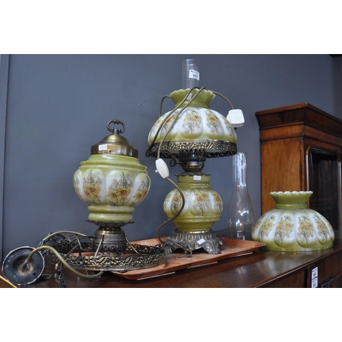 551 - Gilded brass and opaline coloured glass floral table lamp, together with a matching hanging ceiling ... 