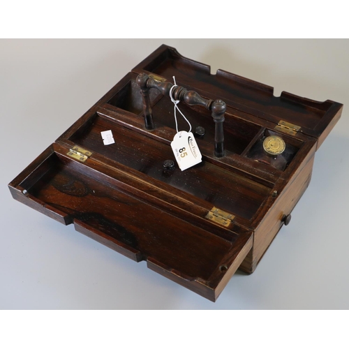 85 - 19th century rosewood travelling desk stand with central carrying handle and various compartments.
(... 