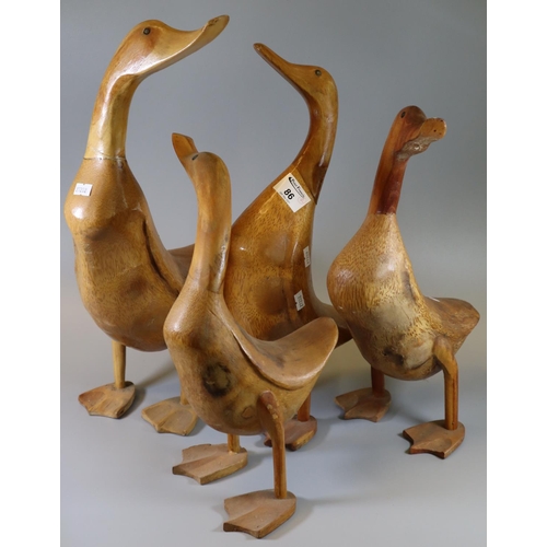 86 - Collection of four wooden novelty ducks.
(B.P. 21% + VAT)