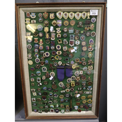 113 - A framed group of interesting enamel pin badges, all related to bowling, some Welsh, some Internatio... 