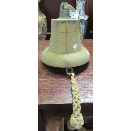 71 - Bronze bell with rope handle. 
(B.P. 21% + VAT)