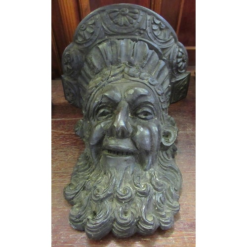 75 - Carved oak mask head wall shelf of Neptune.
(B.P. 21% + VAT)