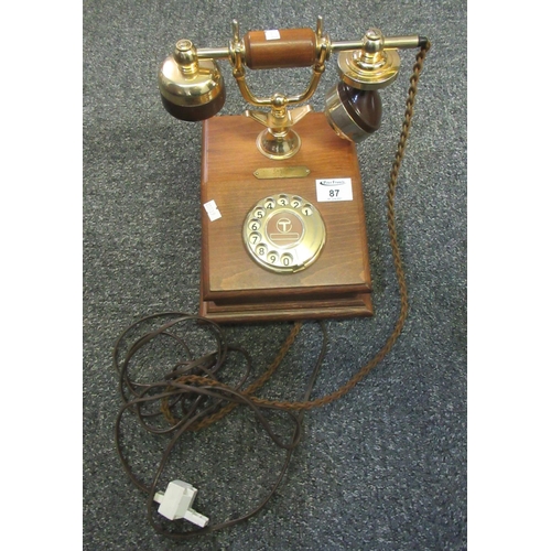 87 - Wooden and brass vintage telephone, marked Made in Italy to the bottom.
(B.P. 21% + VAT)