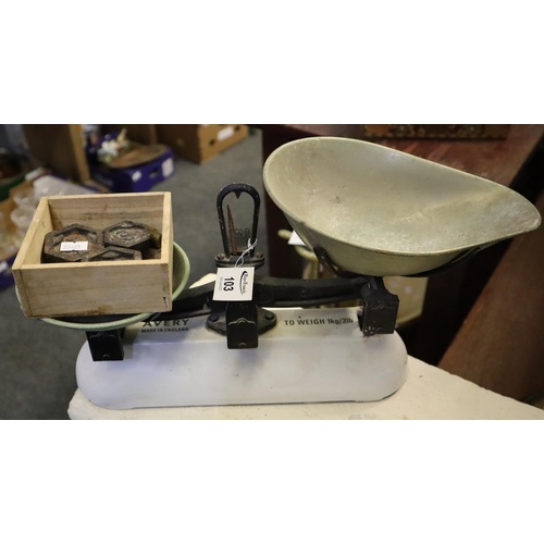 103 - A pair of Avery cast iron and enamelled scales with brass pans and assorted weights.
(B.P. 21% + VAT... 