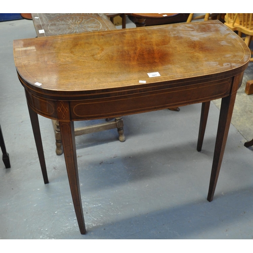501 - 19th Century mahogany inlaid D end folding card table on square tapering legs. 
(B.P. 21% + VAT)
