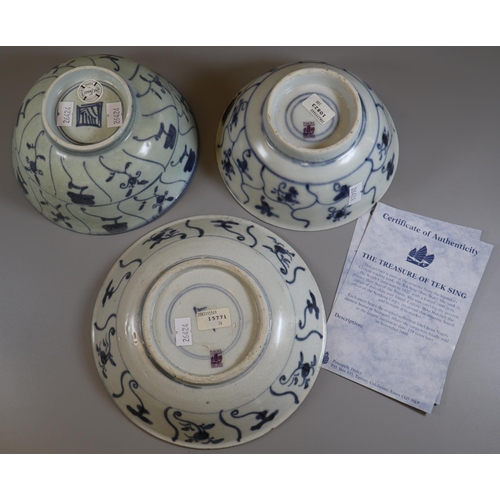 57 - The Treasure of Tek Sing blue and white items to include; a shallow dish and two bowls, all in blue ... 