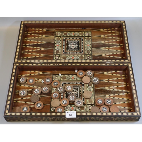 94 - Modern Middle Eastern design inlaid backgammon game. 
(B.P. 21% + VAT)