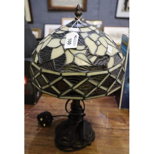 100 - Modern Tiffany style table lamp with a floral and foliate shade.
(B.P. 21% + VAT)