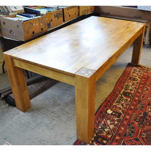 589 - Modern oak dining table on square legs. 102 x 202cm approx. 
(B.P. 21% + VAT)