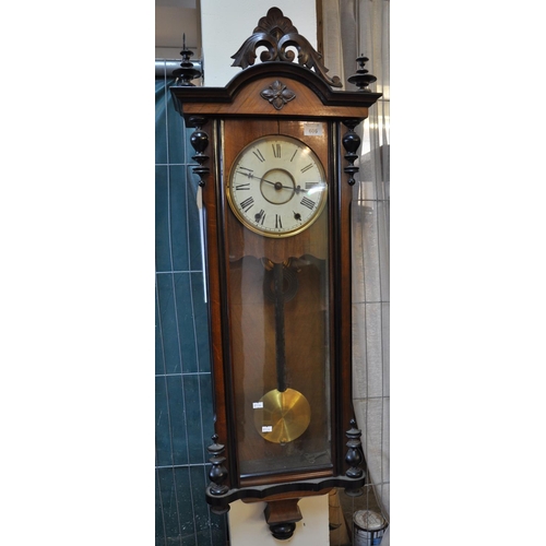 606 - Early 20th Century walnut two train drop dial wall clock with ebonised moulded mounts, key and pendu... 