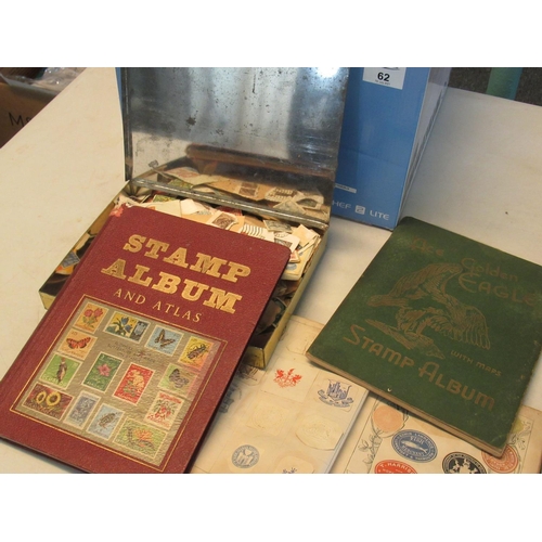 62 - Box of all world stamps in various albums and two tins of loose stamps plus albums of crests monogra... 