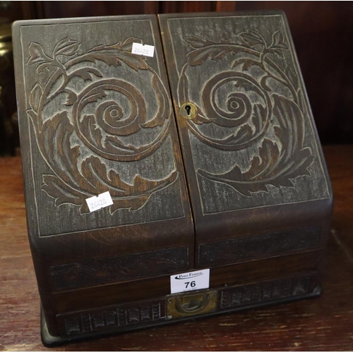 76 - Victorian carved oak slope-front stationary box with a pull-out drawer.
(B.P. 21% + VAT)