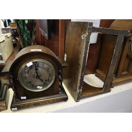 90 - Early 20th century oak two-train barley twist mantel clock of domed form, together with an oak wall ... 