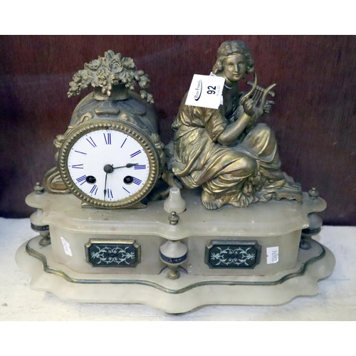 92 - French gilded and alabaster figural two-train mantel clock.
(B.P. 21% + VAT)