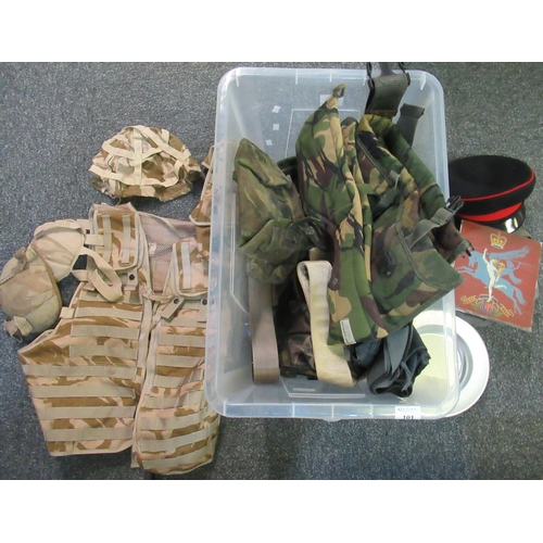 101 - Crate of assorted military uniform items and accessories to include; camouflage items, aluminium pla... 