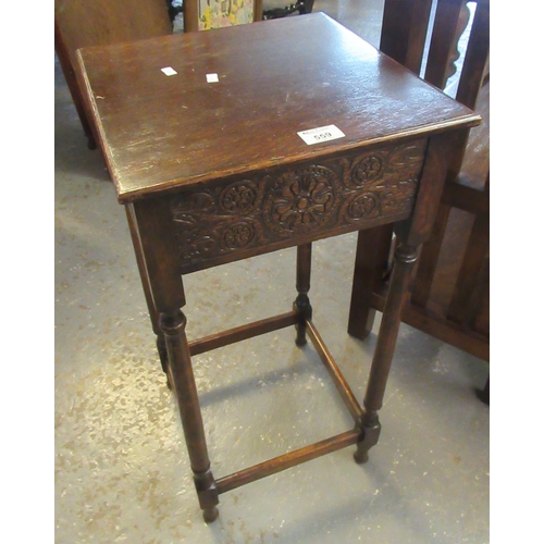 559 - Early 20th Century oak lamp table of square form with carved foliate frieze on turned legs. 
(B.P. 2... 