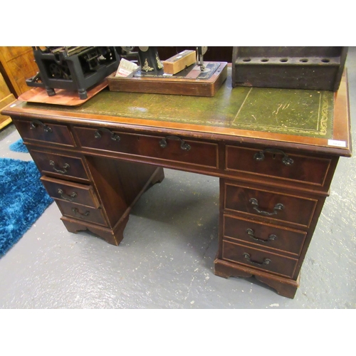 560 - Reproduction yew wood twin pedestal desk.
(B.P. 21% + VAT)