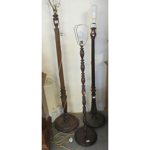 568 - Two Victorian style standard lamps, together with another. Two with shades. (3)
(B.P. 21% + VAT)