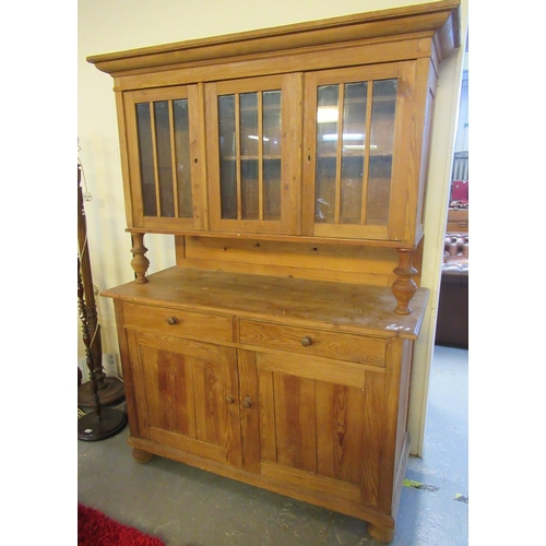 569 - Pine two stage cabinet back glazed kitchen dresser. 
(B.P. 21% + VAT)