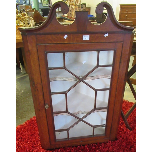 572 - 19th Century oak astragal glazed single door hanging corner cabinet with shaped shelves. 
(B.P. 21% ... 