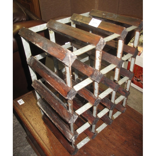 577 - Stained wooden and metal 12 section wine rack.
(B.P. 21% + VAT)