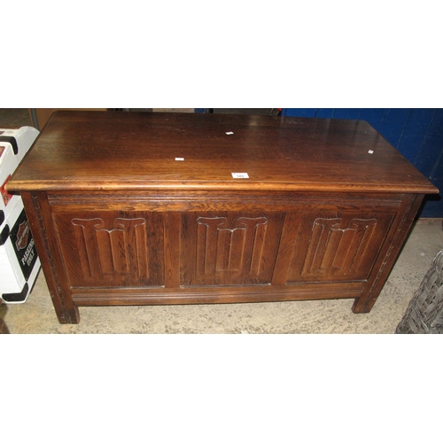 582 - Reproduction oak blanket box in 17th Century style. 
(B.P. 21% + VAT)