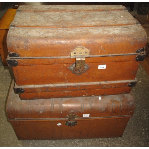 585 - Two similar vintage tin trunks. (2)
(B.P. 21% + VAT)