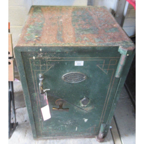 605 - Thomas Withers & Sons Ltd West Bromich, England, cast iron safe with key. 49 x 54 x 78cm approx. 
(B... 