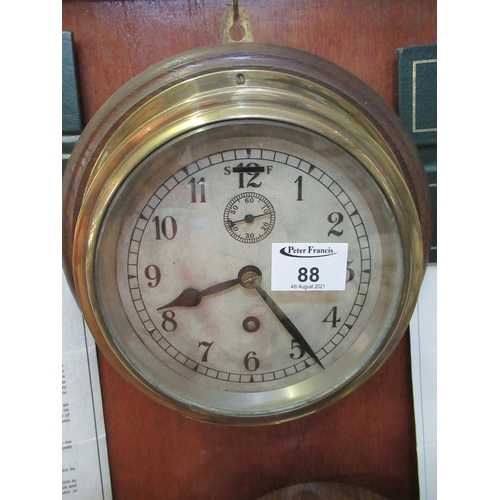 88 - Brass marine type bulkhead clock with Arabic face having seconds dial, single train movement mounted... 