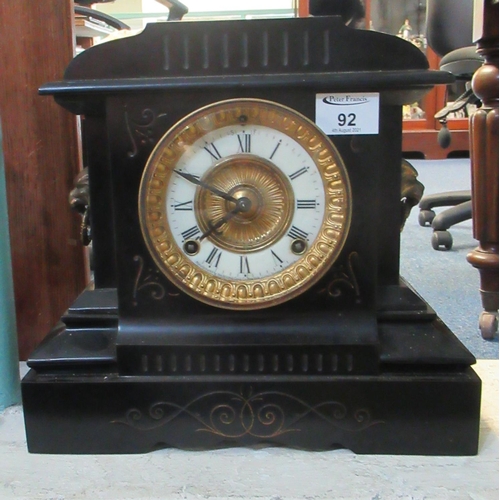 92 - Late 19th/early 20th Century black slate architectural mantel clock with lion mask mounts and cerami... 