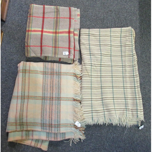 96 - Three vintage woollen check blankets in various colours. One a narrow loom blanket. (3)
(B.P. 21% + ... 