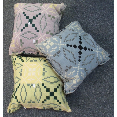 99 - Three woollen Welsh tapestry cushions in different colours. (3)
(B.P. 21% + VAT)