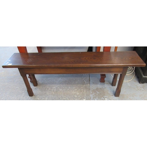 612 - Mid Century oak bench of rectangular form with chamfered legs. 
(B.P. 21% + VAT)