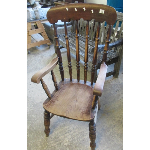 623 - Late 19th/early 20th Century elm and beech spindle back farmhouse elbow chair. 
(B.P. 21% + VAT)