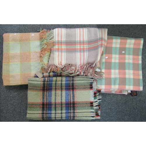 102 - Three check design woollen blankets or carthen, two with a Derw product, made in Wales, pure new woo... 